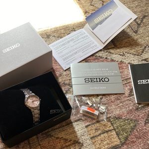 Seiko Women’s pink dial stainless watch